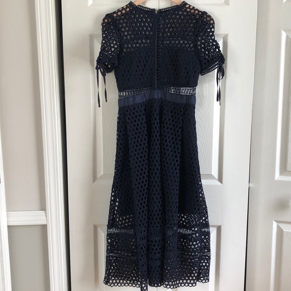 Navy blue fit-and-flare crochet cocktail dress